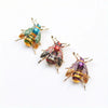 Buzzy Wuzzy Bumblebee Brooch - A cute stylised enamel bumblebee brooch, available in six different colour palettes.