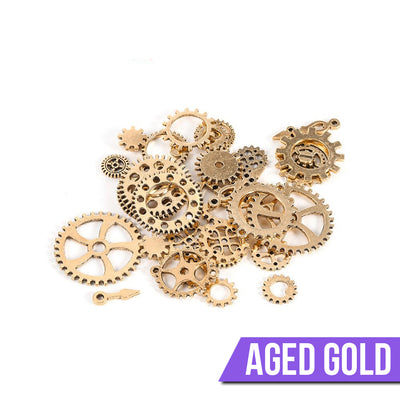 Cheeky Crafter Steampunk Gears - A pile of little metal gears designed for crafting, in a mix of gold, silver, bronze, copper, and other metallic colours.