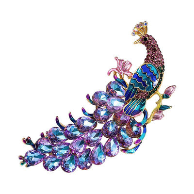 The Juno Crystal Peacock Brooch - A lovely stylized peacock brooch featuring glossy enamel paint and sparkling crystals.