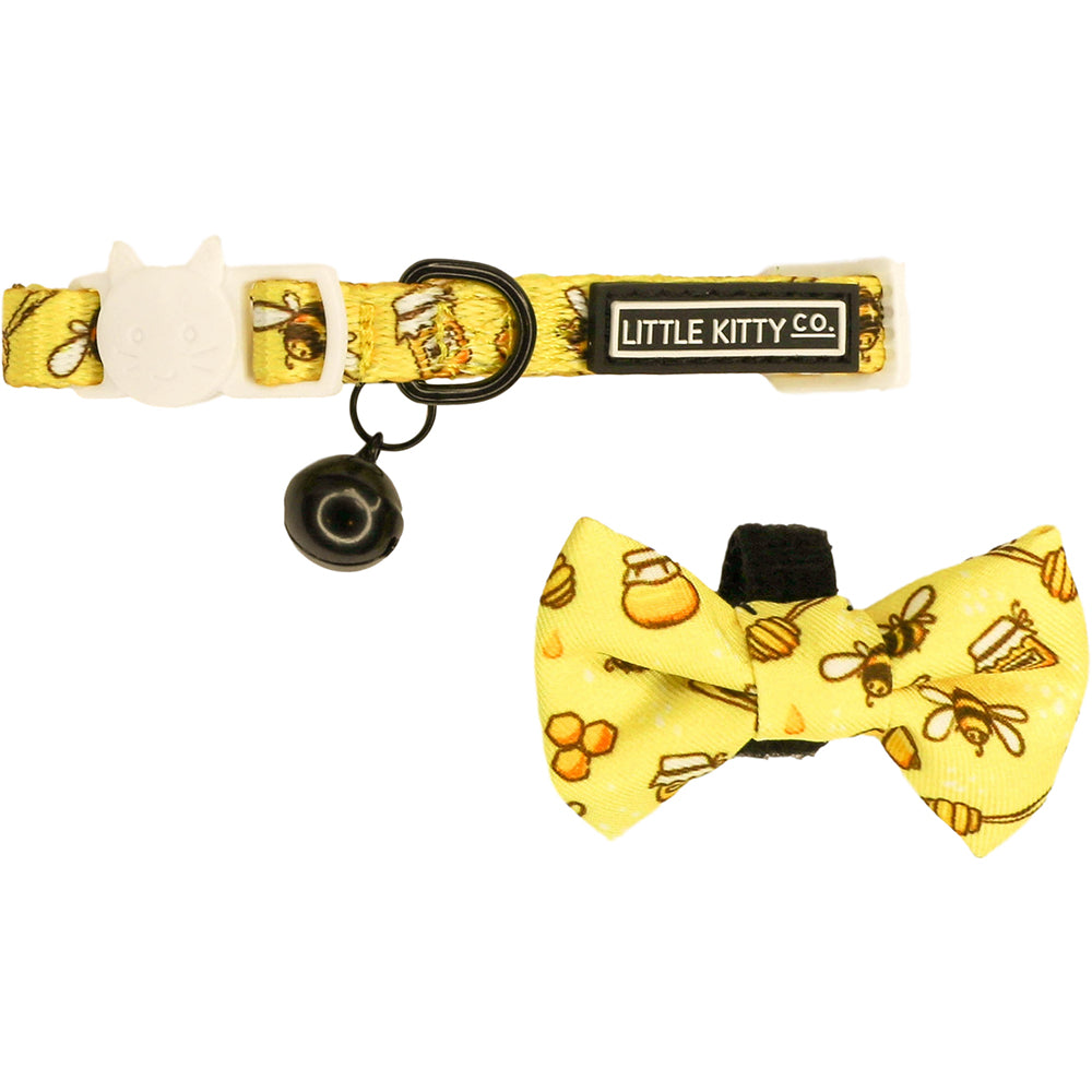 Little Kitty Co. Cat Collar & Bow Tie - Bee-Hiving is a vibrant yellow design featuring an adorable little print of cartoon bumblebees and honey. Buzz buzz, baby!