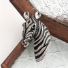 Majestic Zebra Oversized Brooch - An impressively large brooch crafted to look like the head and neck of a zebra in a relaxed pose.