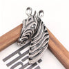 Majestic Zebra Oversized Brooch - An impressively large brooch crafted to look like the head and neck of a zebra in a relaxed pose.