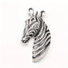 Majestic Zebra Oversized Brooch - An impressively large brooch crafted to look like the head and neck of a zebra in a relaxed pose.