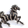 Zesty Zebra Brooch - A medium sized brooch shaped like a zebra running with its mane and tail flowing in the wind. It's available in gold or silver colours, and is studded with crystals.