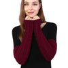 The Snuggle Weather Arm Warmers - A pair of adorable knit over-elbow arm warmers available in nine snuggly winter colours: Blackout (black), Hot Chocolate (dark brown), Tempest (dark grey), Overcast (light grey), Gingerbread (light brown), Snowdrift (white), Mulberry (dark red), Rosé (dusky pink), and Vanilla (cream).
