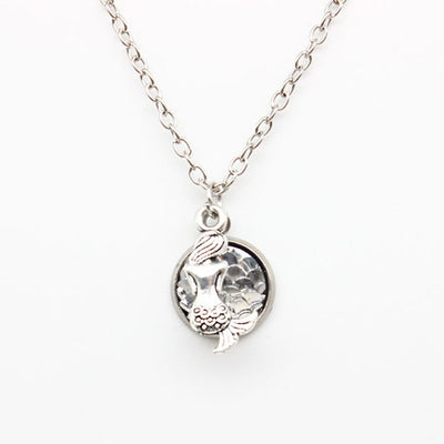 The Nereid's Heart Pendant - A lovely iridescent scaled necklace.
