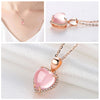 The Aphrodite Necklace - A lovely heart-shaped pendant with pink opals and crystals.