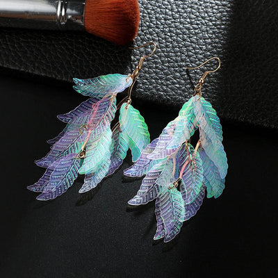 Beautiful iridescent pearlescent leaf earrings.