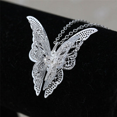 The Vanessa Necklace - A simple silver butterfly, intricately detailed in a lace-like style.