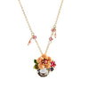 The Pretty Posy Enamel Necklace - A delicate floral pendant in an unusual shade of orange.