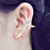 An adorable shooting star ear cuff.