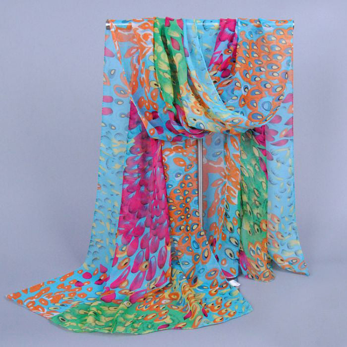 Beautiful chiffon scarves with peacock feather designs in a variety of vibrant colours.