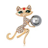 The Purrfect Ten Brooch - An adorable cat-themed brooch in gold and crystals.