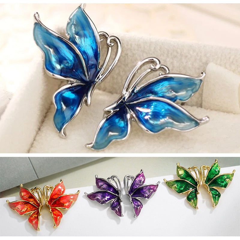 Vibrantly colourful enamel earrings with a butterfly motif, available in blue, green, purple, and red. 