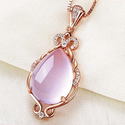 The Merope Necklace - A lovely delicate pink opal pendant studded with crystals.