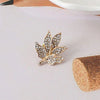 Autumn & Winter Leaf Brooch - a tiny leaf brooch available in gold or silver colour.