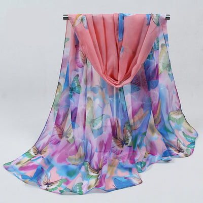 Beautiful chiffon scarves with butterfly designs in a variety of vibrant colours.