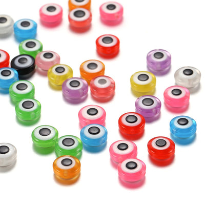 Cheeky Crafter Bountiful Bead Kits - Evil Eye - Small round plastic beads with an eye theme, available in an assortment of bright colours. Come stored in a cute metal tin with a retro themed print.