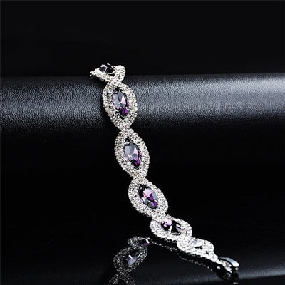 The Zahra Bracelet - A lovely, luxurious crystal bracelet with topaz or amethyst and zircon, set against platinum coloured metal.