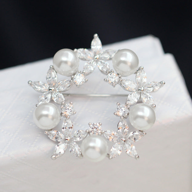 The Radiance Brooch - Wreath - A stunning crystal brooch shaped like a circle of flowers.