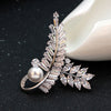 The Radiance Brooch - Fern I - A stunning crystal brooch shaped like a pair of fern fronds.