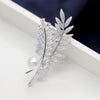 The Radiance Brooch - Fern II - A stunning crystal brooch shaped like a pair of fern fronds.