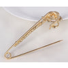 Scarf pins in assorted swan designs, gold colour with zircon crystals.