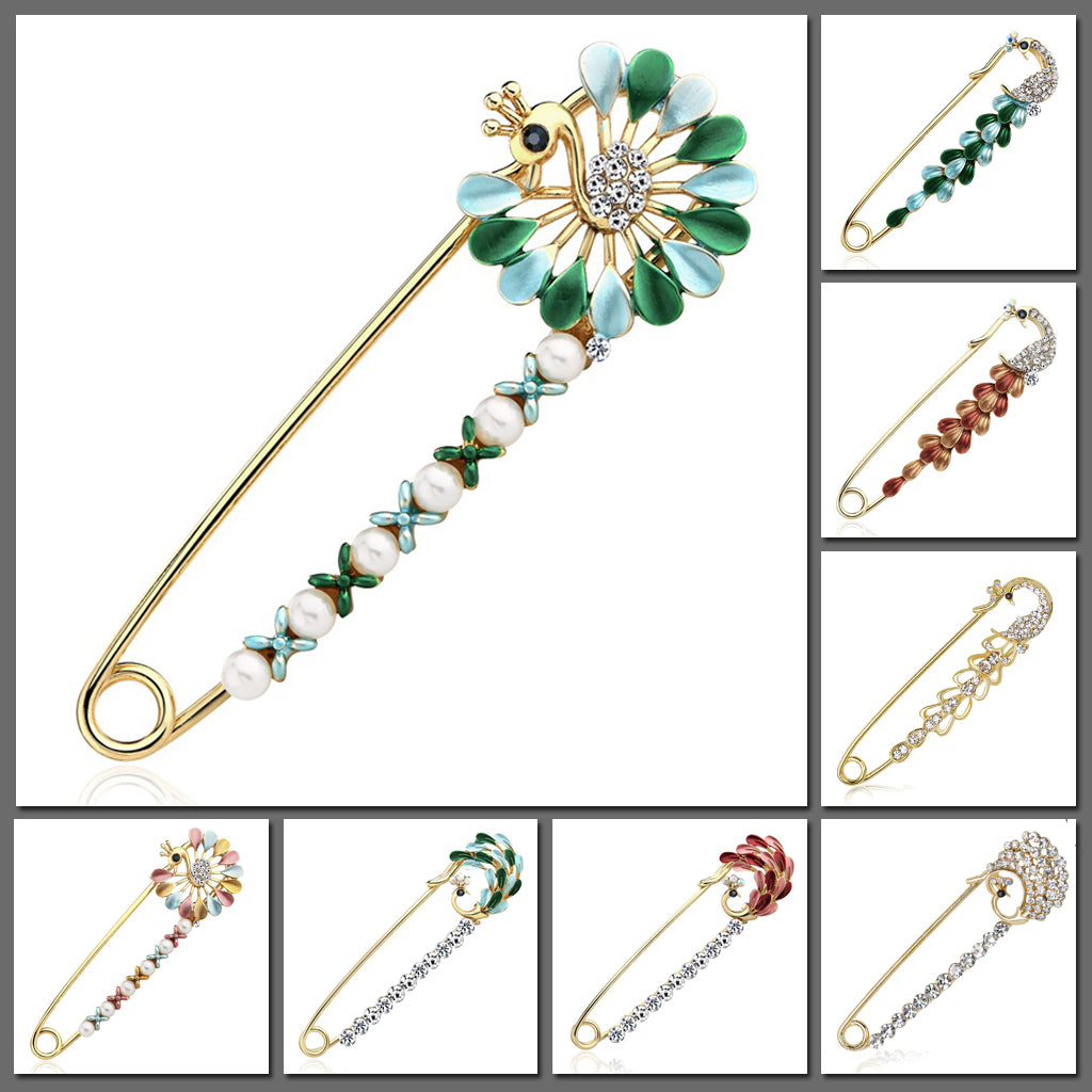 Scarf pins in assorted peacock designs, gold colour with zircon crystals and colourful enamel.