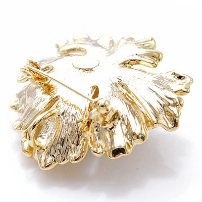 The Delphine Brooch - A lovely oyster flower brooch available in eight stunning colour combinations.