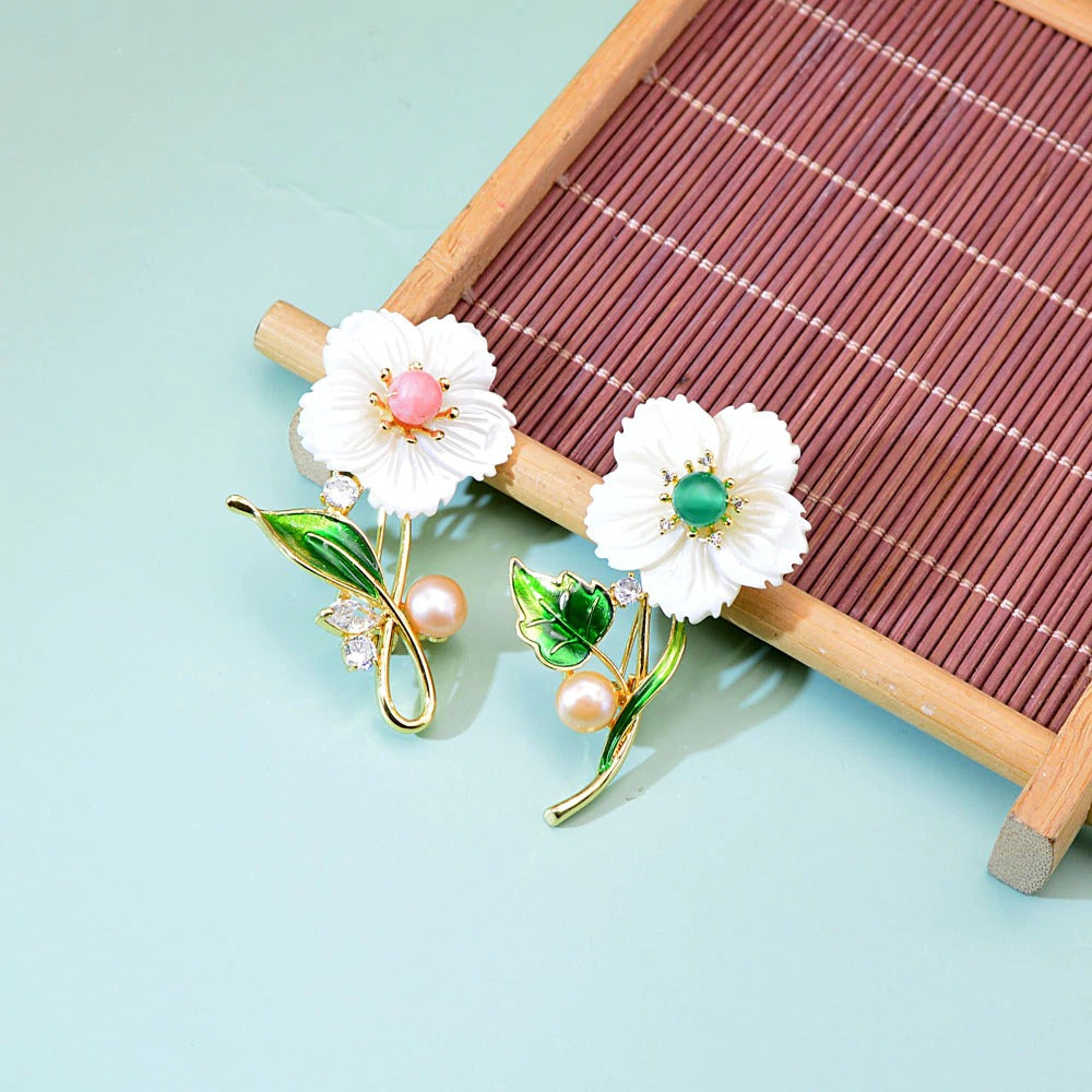 The Sylvan Stone Brooch - Shell Daisy - An adorable floral brooch made of carved stone to resemble shell, with either a pink or green stone in the centre. 