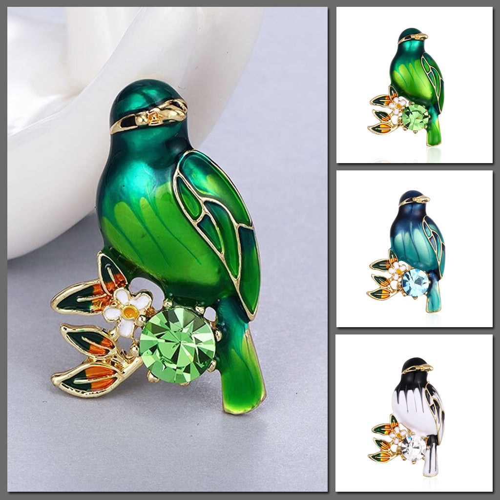 Cute Critters Brooch - Songbird - An adorable little bird perched on a sprig of flowers, adorned with brightly-coloured enamel and crystals. Available in green, blue, or black and white.