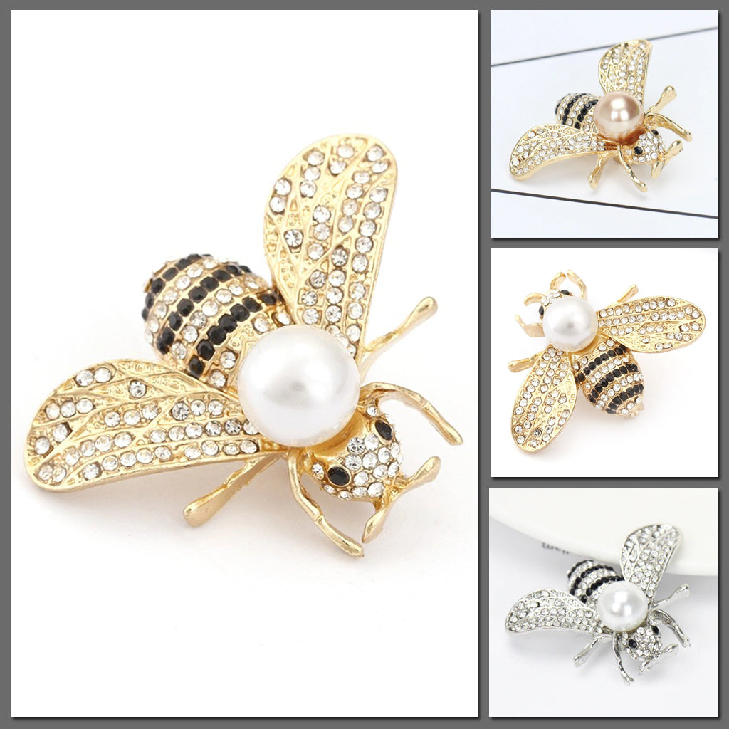 Queen Bee Brooch - A lovely rhinestone brooch shaped like a honeybee, and adorned with a large pearl. Available in gold or silver, with white or gold coloured pearls. 