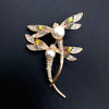 Dragonfly Duet Brooch - A lovely brooch featuring two crystal-encrusted dragonflies dancing in an imaginary breeze.