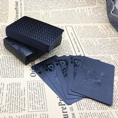 Charon's Call Black-On-Black Playing Cards - Textured black playing cards with a geometric print on the back.