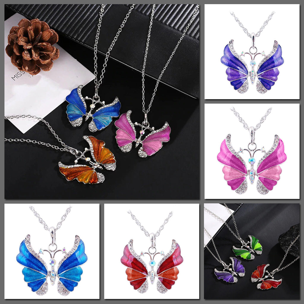 The Adonis Butterfly Necklace - Beautiful medium length silver coloured necklaces with butterfly pendants in blue, green, red, pink, purple, and honey orange gold. 