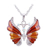 The Adonis Butterfly Necklace - Beautiful medium length silver coloured necklaces with butterfly pendants in blue, green, red, pink, purple, and honey orange gold.