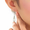 Amelia Opal Drop Hook Earrings - Lovely small teardrop shaped opal earrings with silver findings, suspended from a french hook.