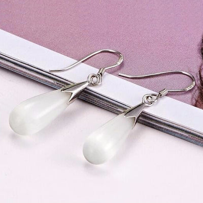 Amelia Opal Drop Hook Earrings - Lovely small teardrop shaped opal earrings with silver findings, suspended from a french hook.