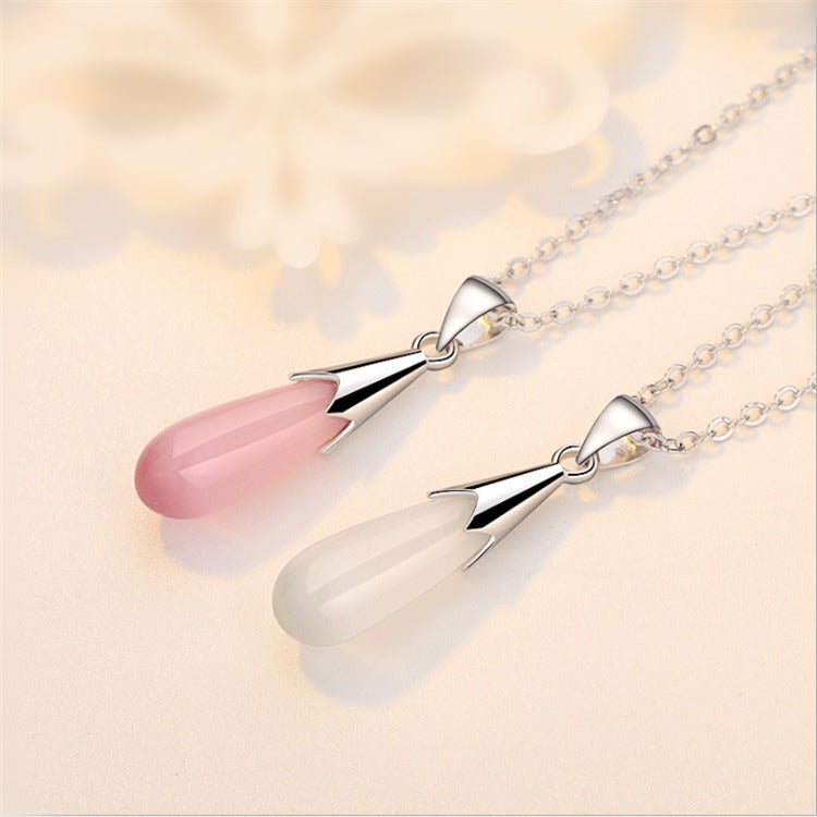 Amelia Opal Drop Pendant - A lovely small teardrop shaped opal pendant with silver findings, suspended from a silver box chain.