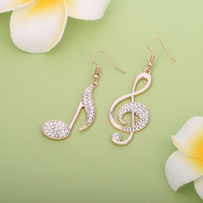 Aretha Asymmetrical Dangle Earrings - Large, elegant earrings featuring a different musical note on each ear, studded with beautiful crystals.