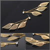 The Autumn Breeze Dangle Earrings - Long drop earrings with a lovely leaf motif.