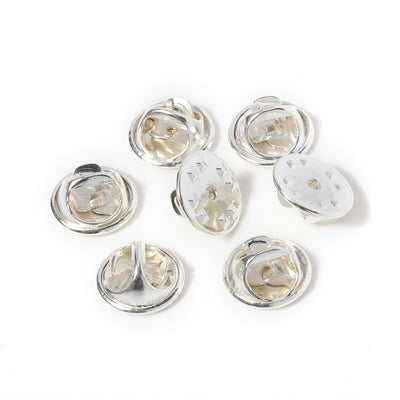 Loose Brooch Pin Backs - A pile of brooch pin backs in Bright Silver colour.