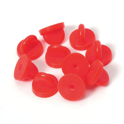 Loose Brooch Pin Backs - A pile of rubber brooch backs in red.