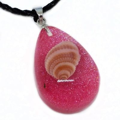 Calypso's Tear Necklace - A teardrop-shaped resin necklace featuring a tiny little seashell trapped in coloured amber, strung on a surfer-style leatherette necklace.