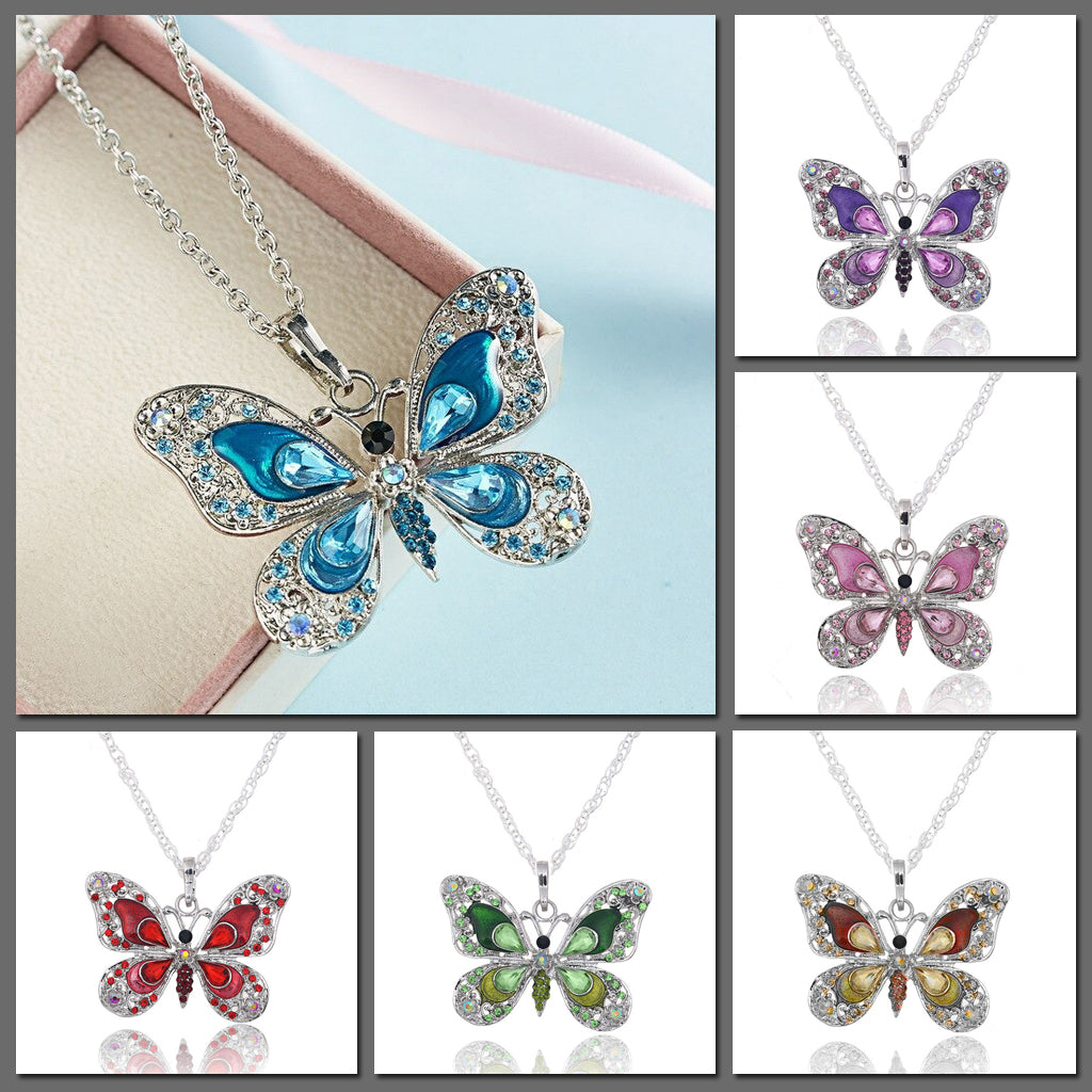 The Cethosia Butterfly Necklace - Beautiful medium length silver coloured necklaces with butterfly pendants in blue, green, red, pink, purple, and honey orange gold. 