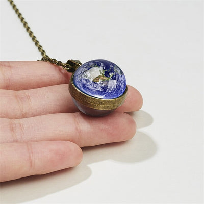 Cheeky Geek Stargazer Glow-In-The-Dark Planet Pendant - Small round glass pendants with images of different planets in the middle, which glow in the dark.