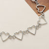 Colette Cut-Out Heart Choker - A close-fitting choker style necklace featuring a series of interlinked hollow heart charms.