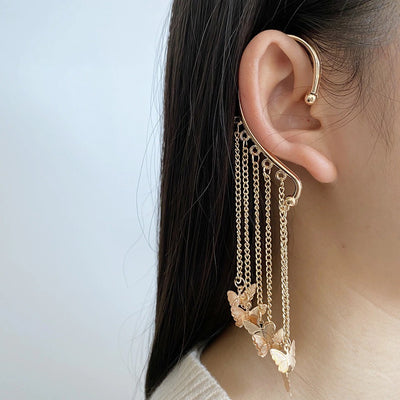 Dana Butterfly Ear Cuff - A non-pierced ear cuff adorned with chains and tiny butterfly charms.