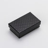 Diamond Embossed Jewellery Gift Box - An assortment of different sized gift boxes, which are made of black paper with a diamond lattice print embossed into it.
