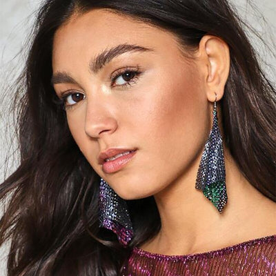 The Diva Drape Earrings - Large triangular earrings made from aluminium mesh fabric, which is made of metal but behaves like fabric, to it shifts and shimmers as it catches the light.